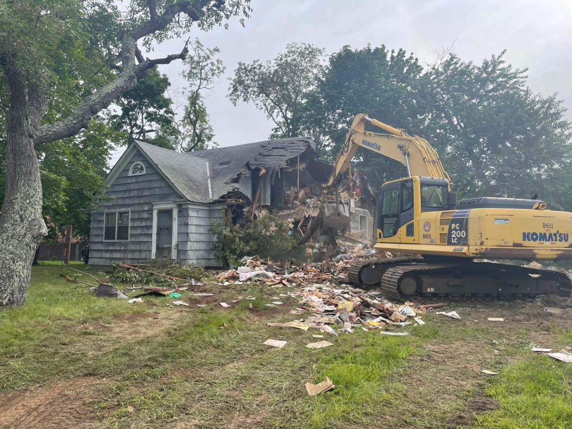 Town Crews Demolish Hazardous Zombie Home in Plainview